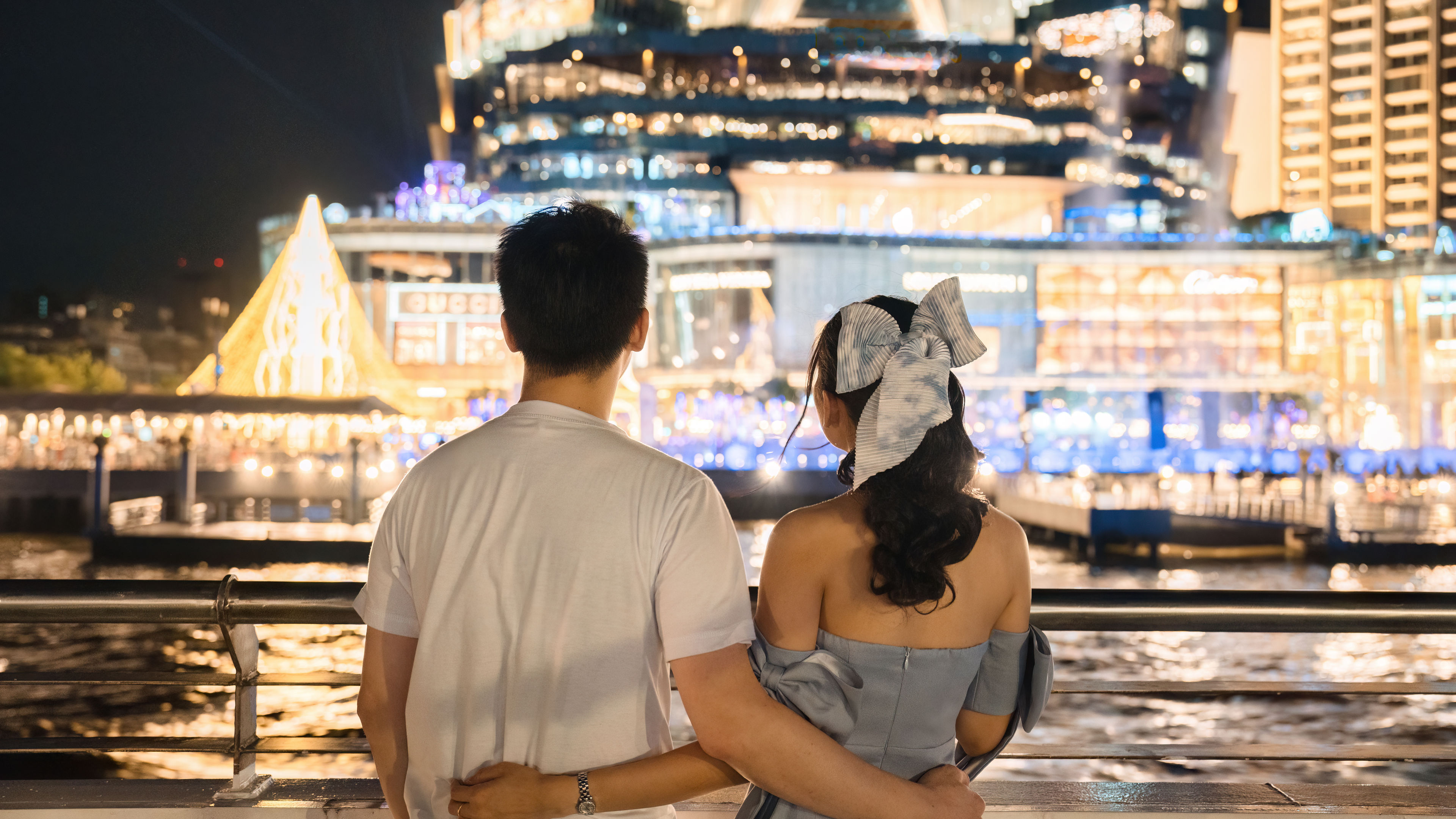 happy couple enjoying night view