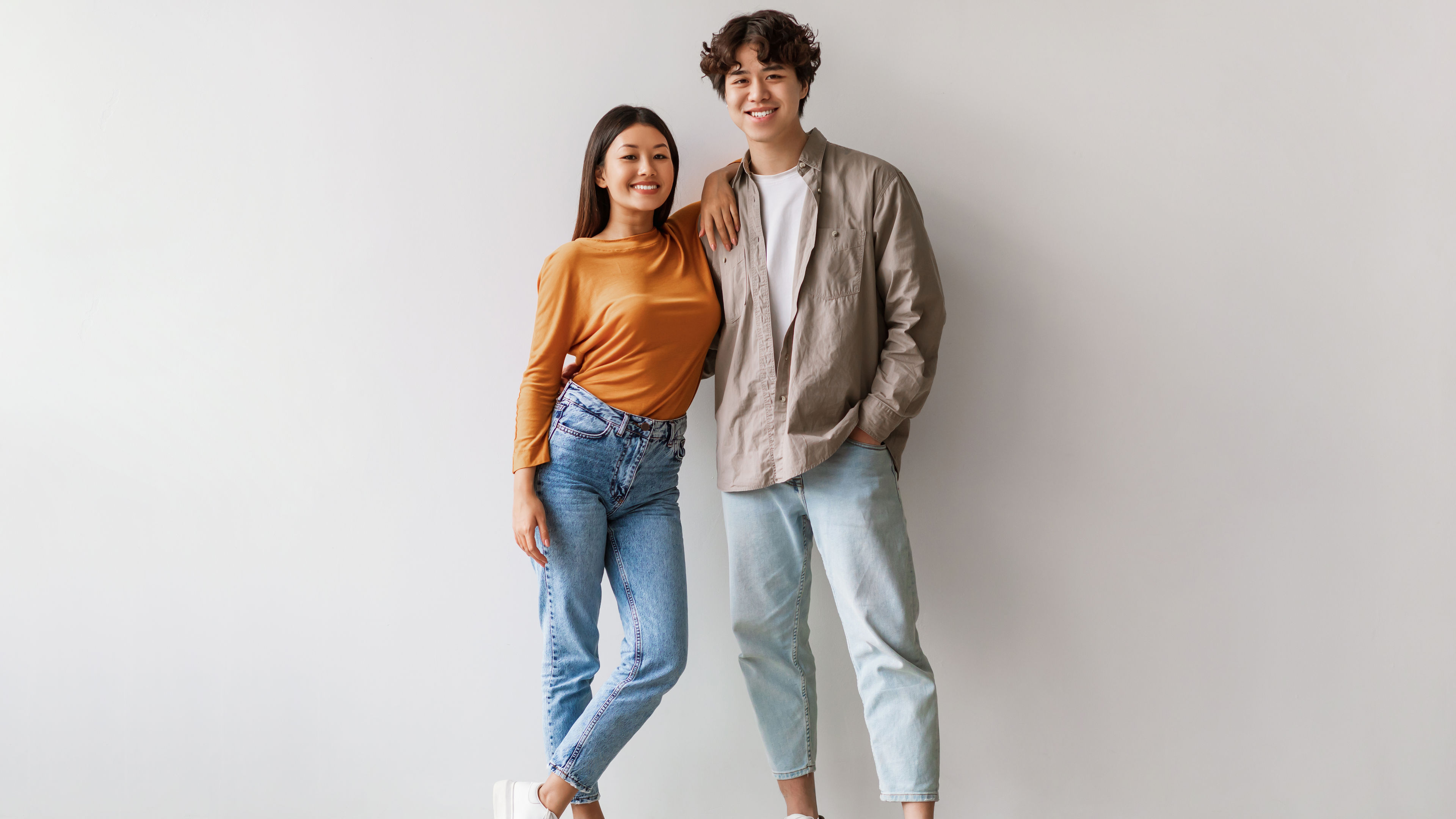 Happy young couple in casual clothes