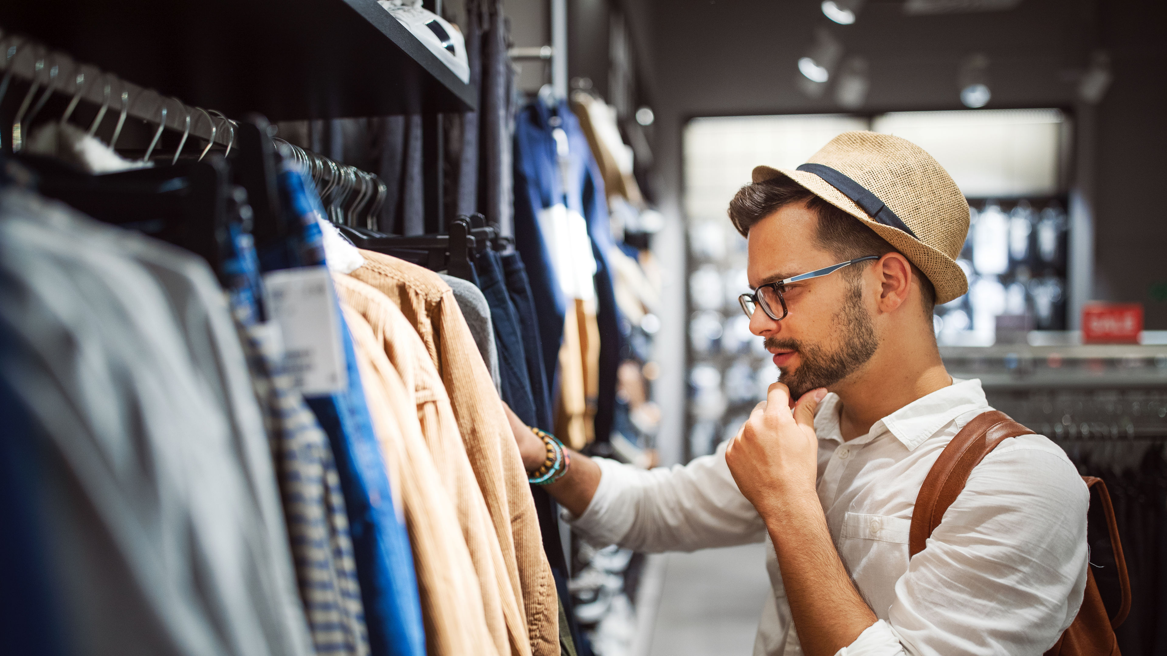 A young man shopping clothes 