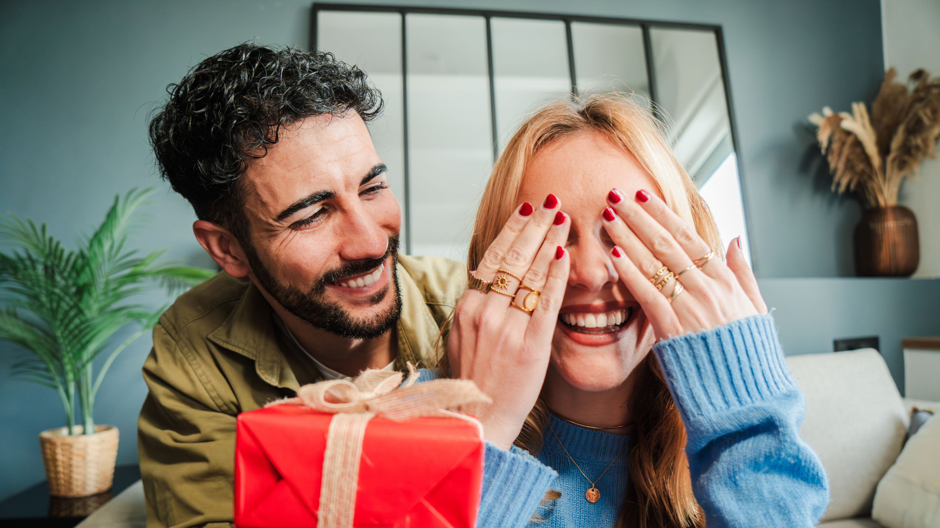 A man surprising wife with a hamper