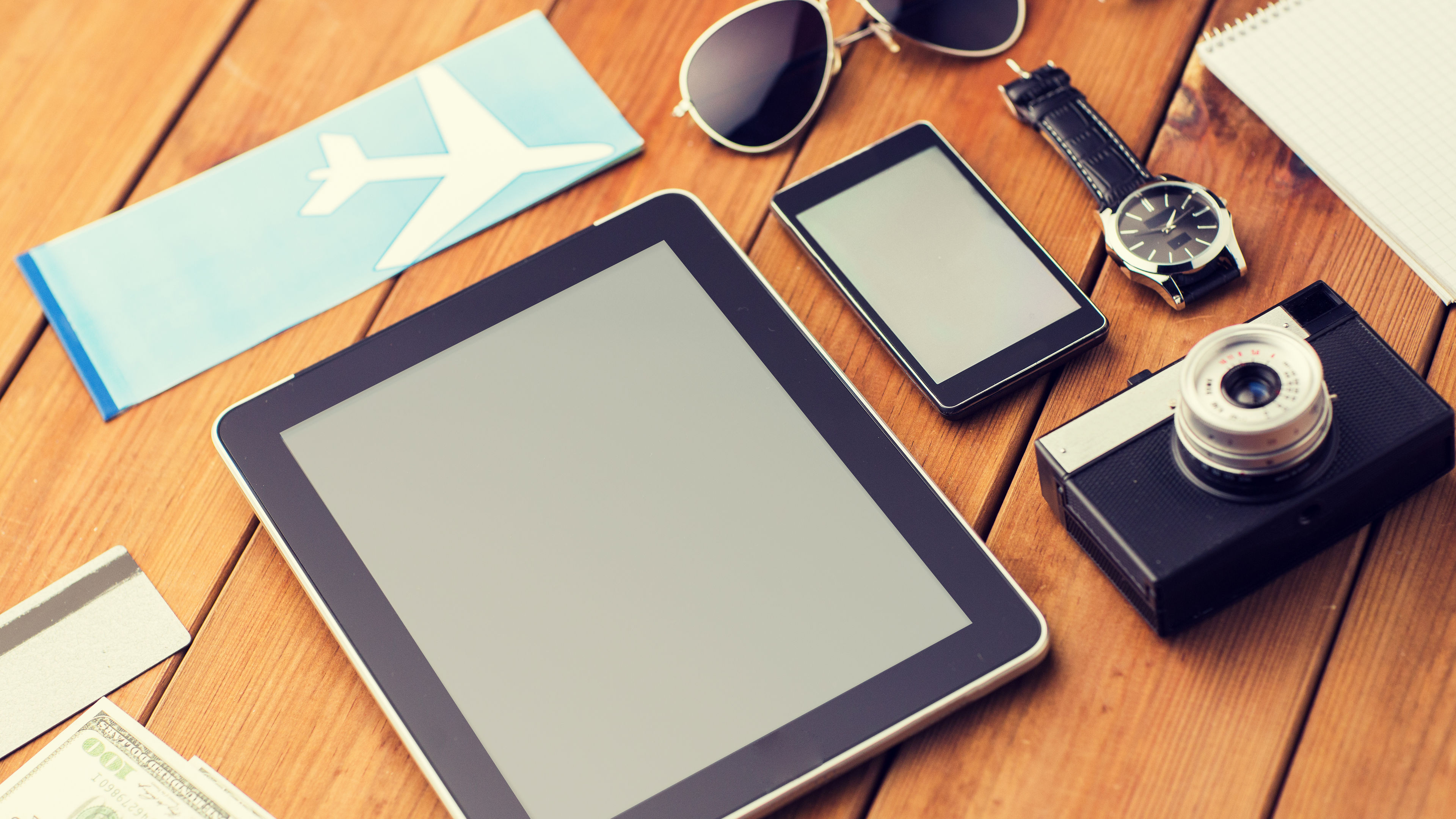 close up of smartphone and travel stuff