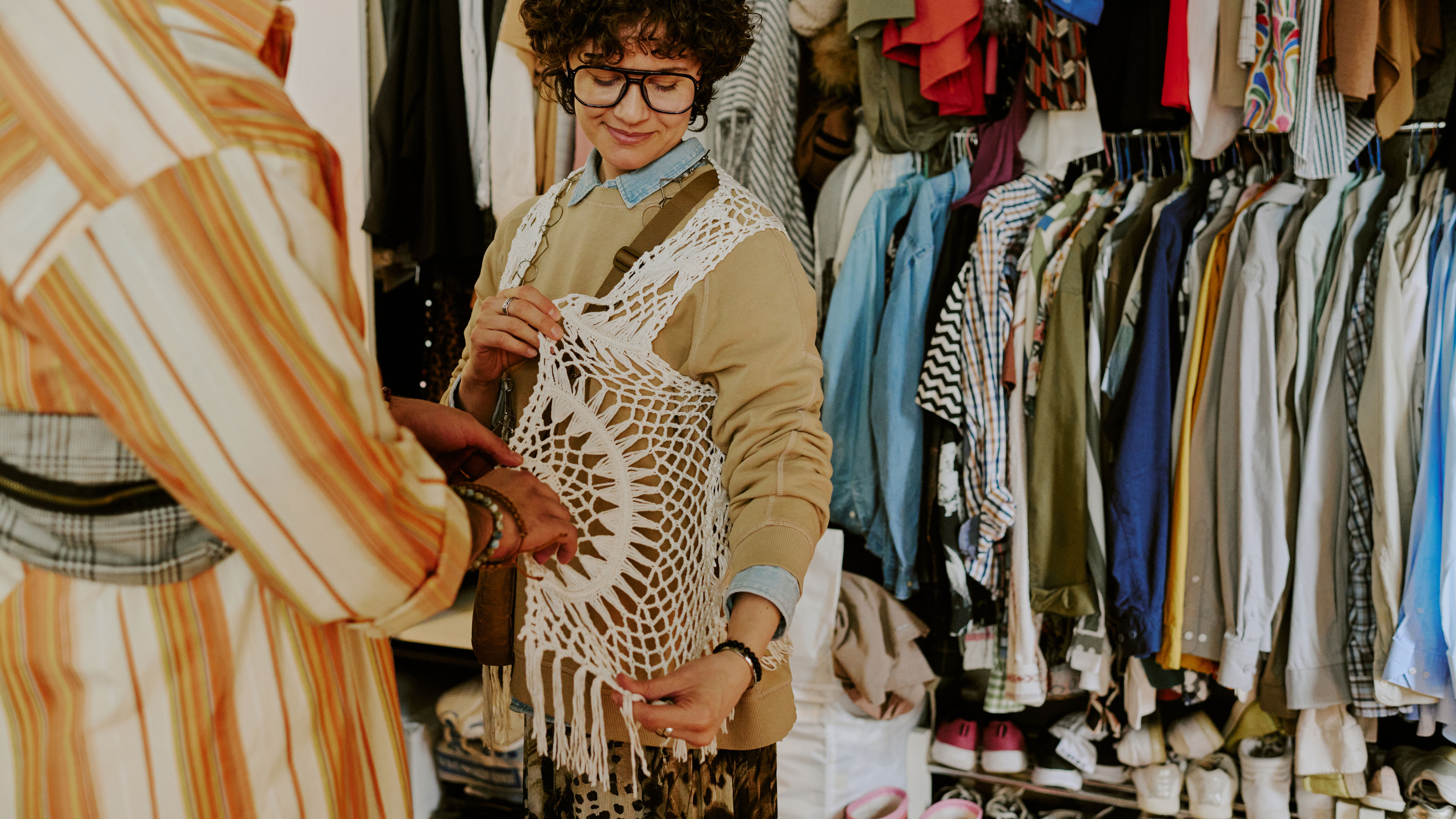A woman is shopping fabrics