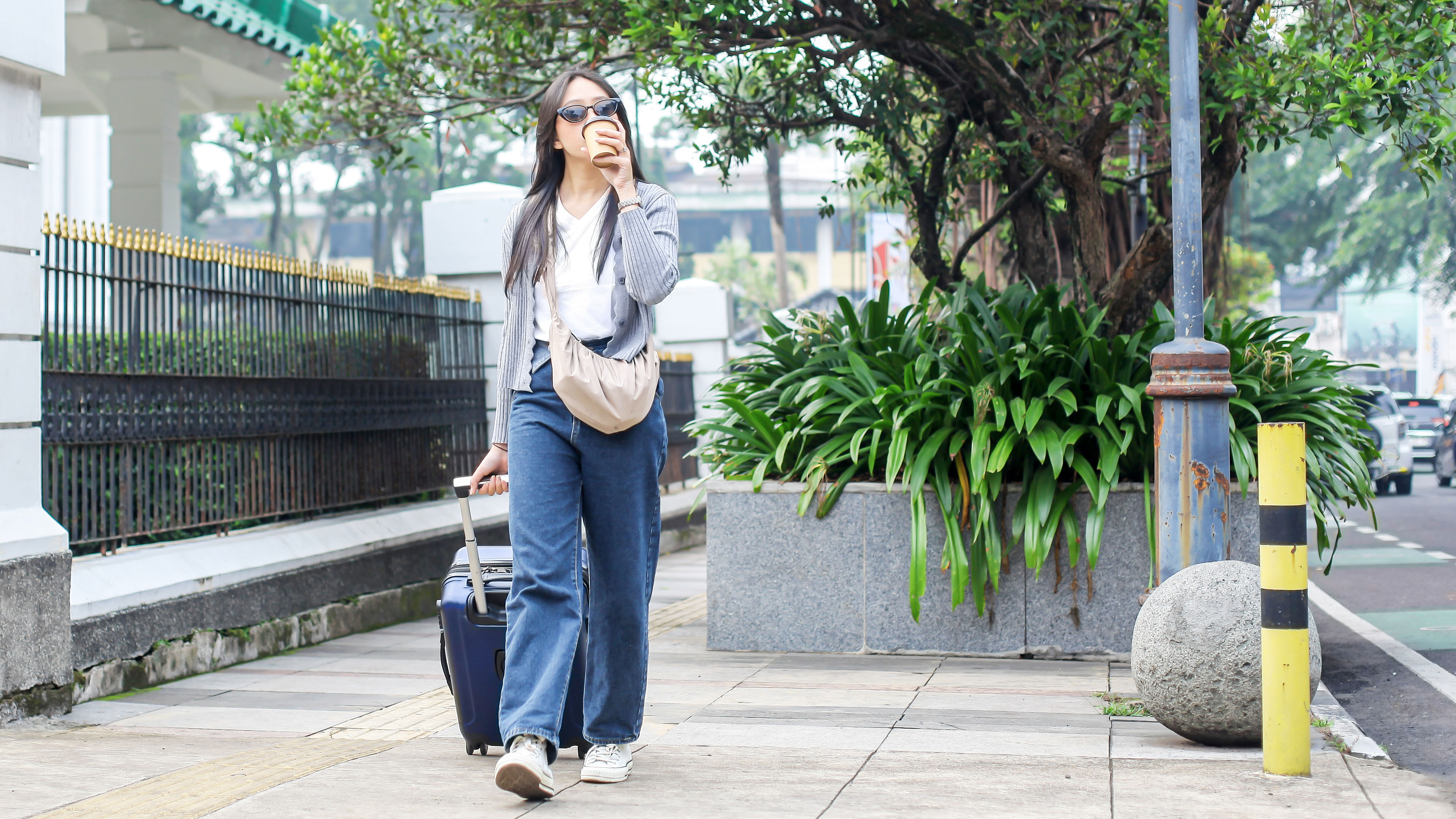 Tourist Woman Strolling Around The City