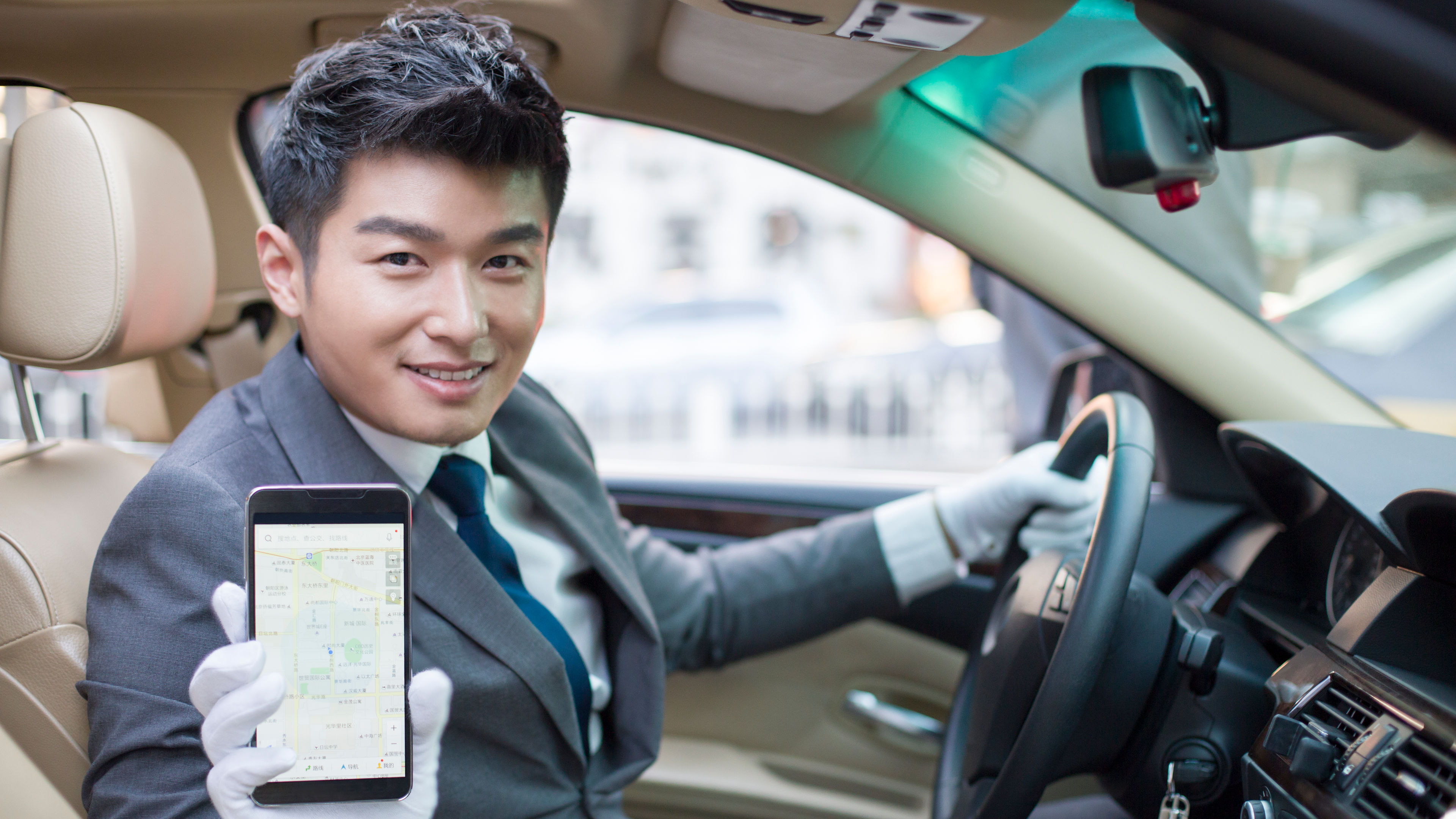 Well Dressed Man Holding Phone