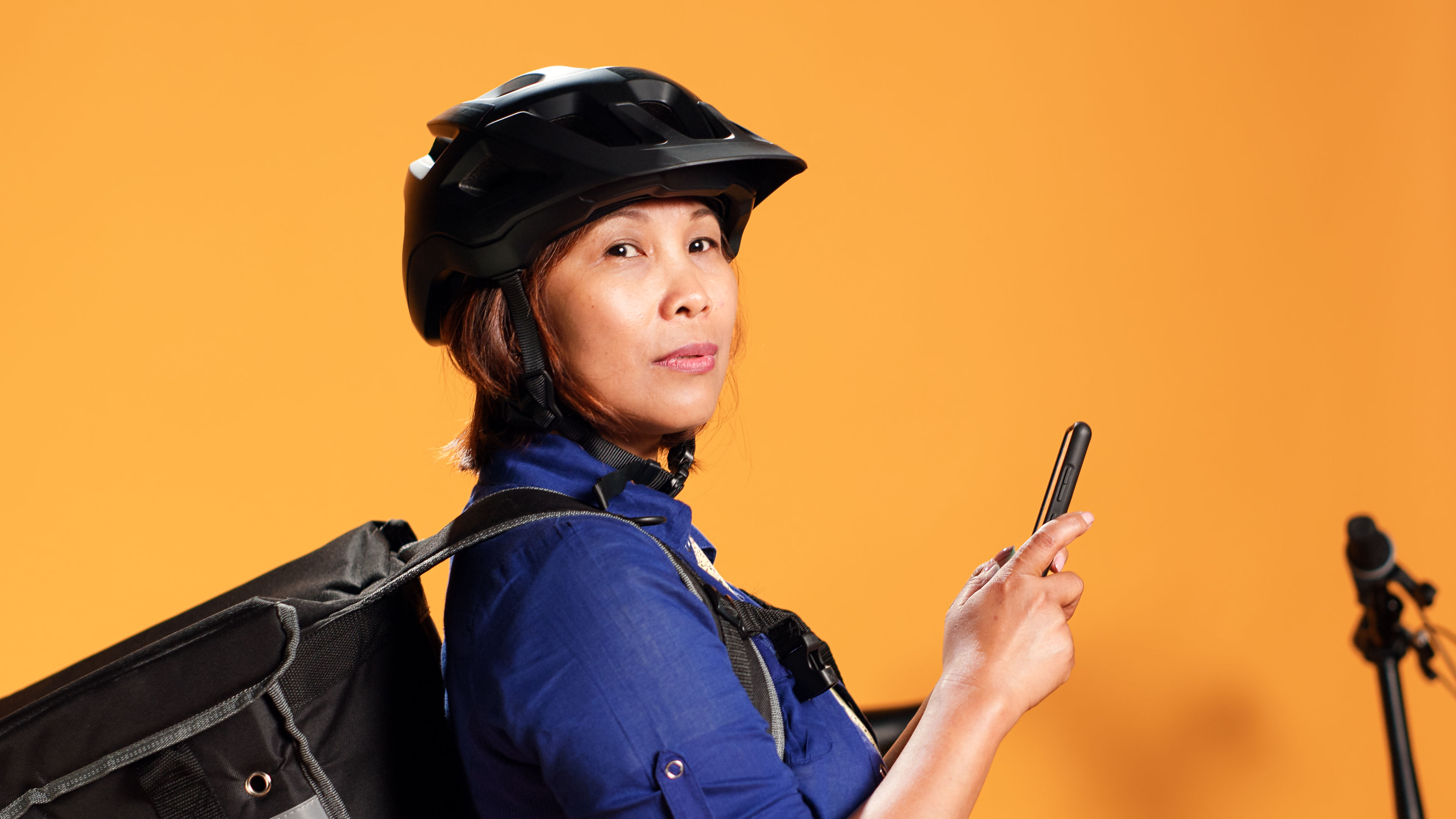 Woman with helmet with delivery
