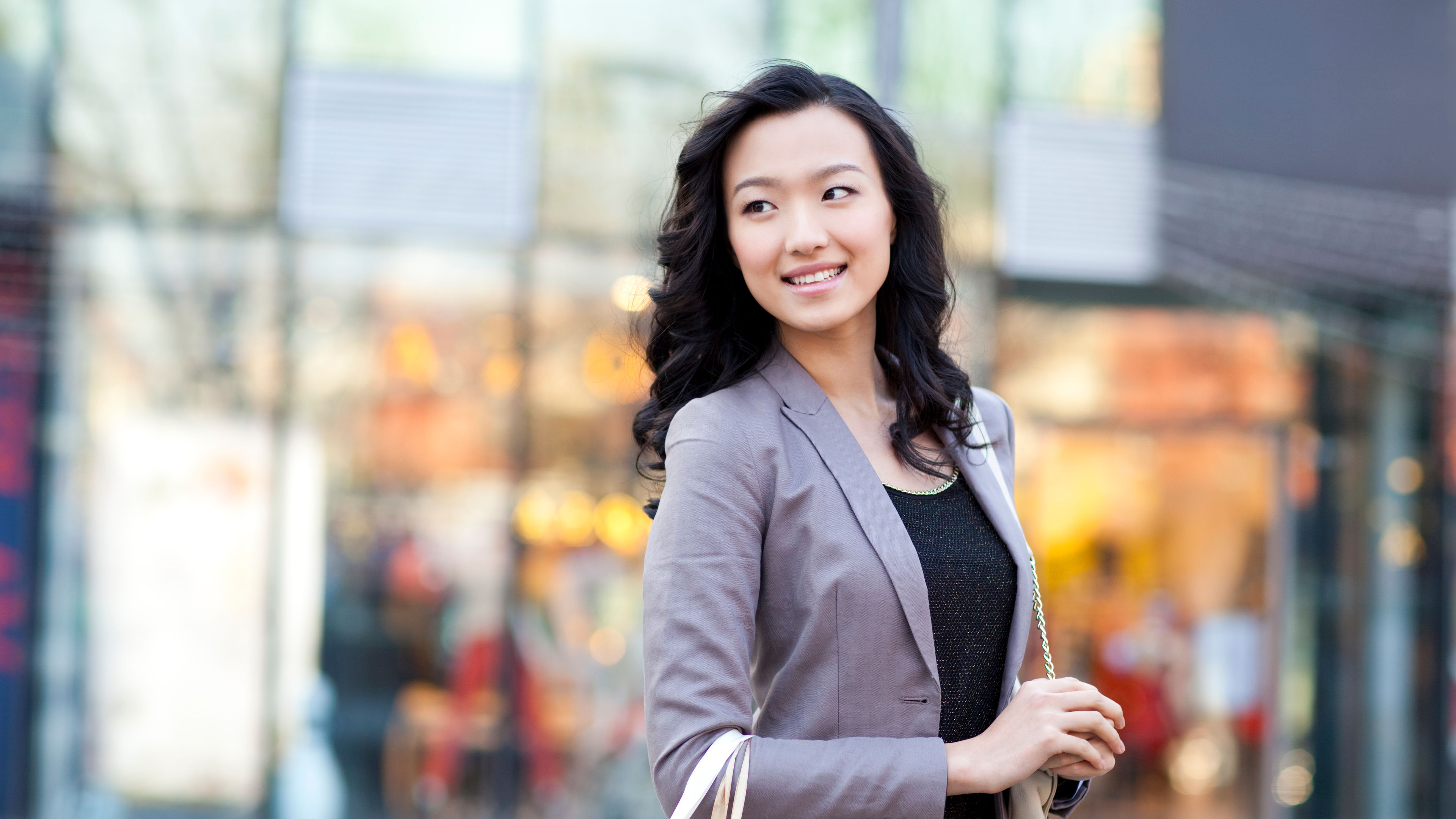 Image of a young woman with bags 