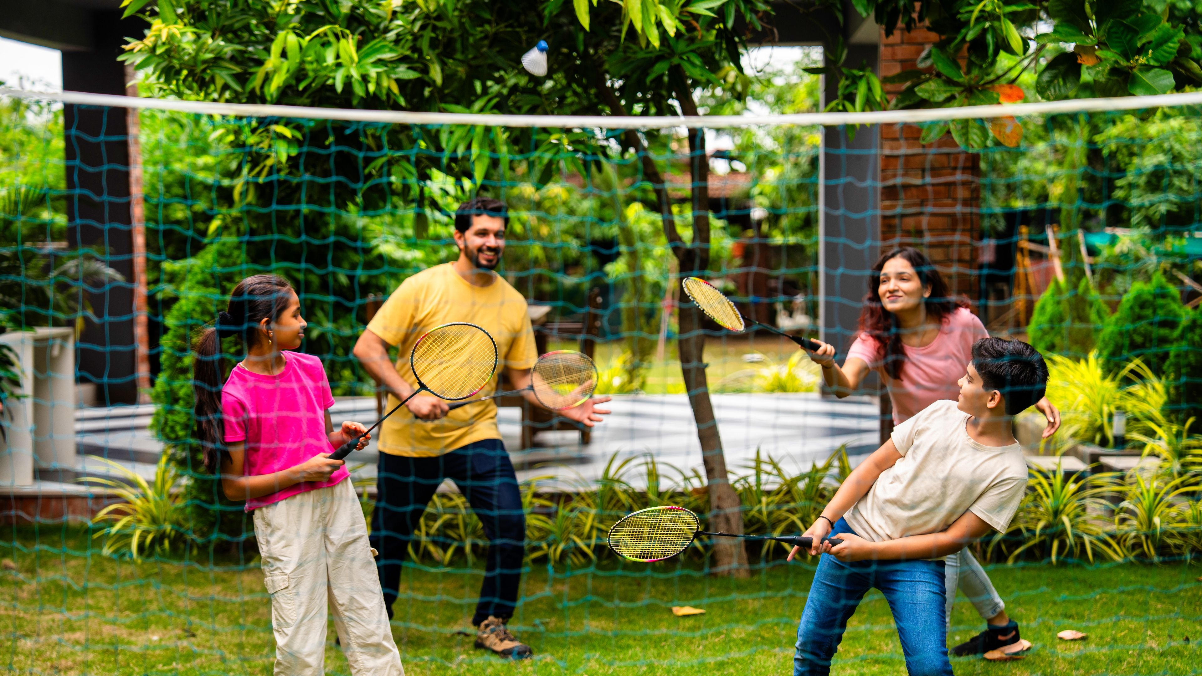 A family playing badminton 