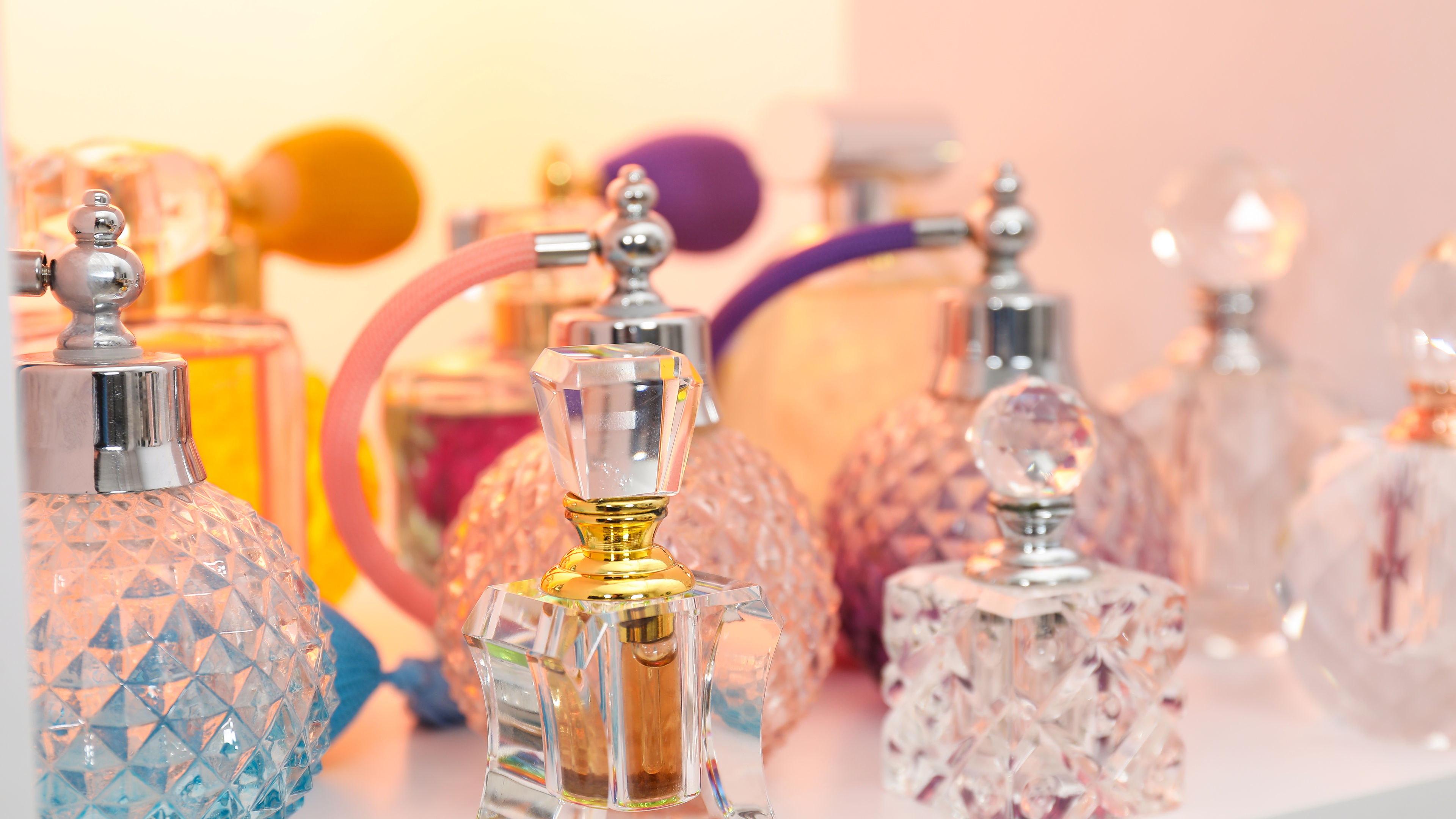 Different bottles of luxury perfume