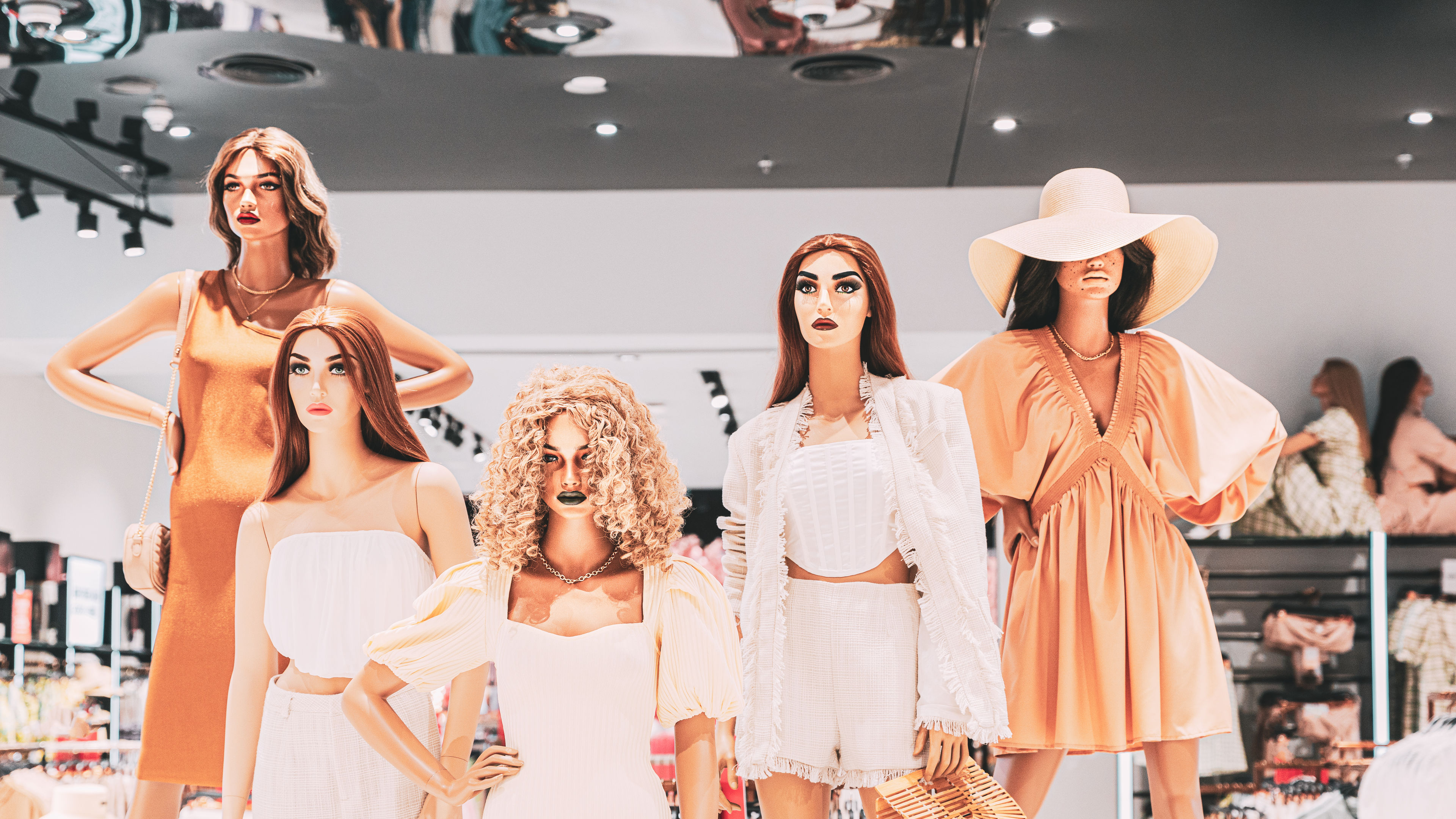 Female mannequin in store mall market. Mannequins dressed in woman fashion 