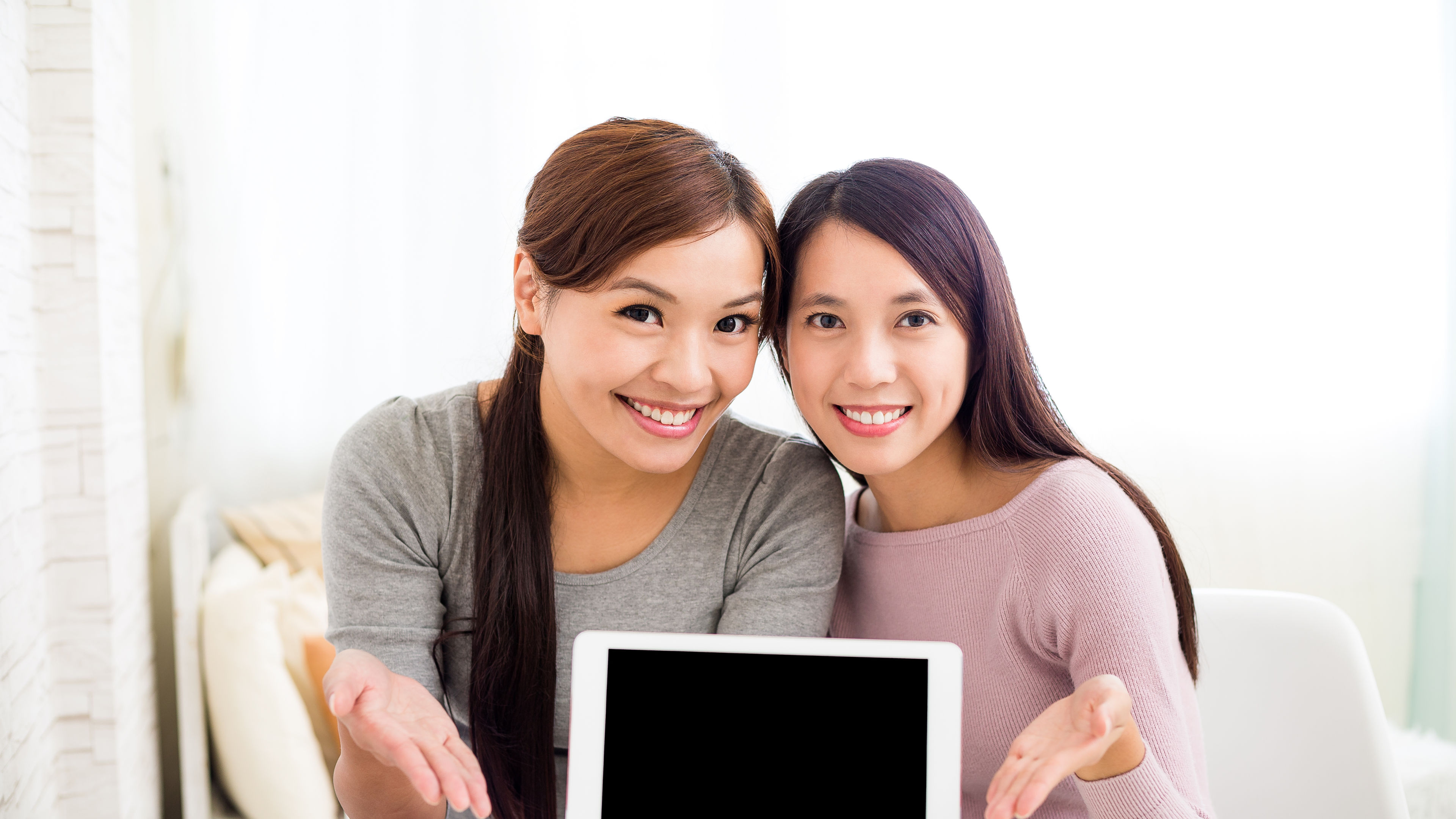 Girls Showing Tablet