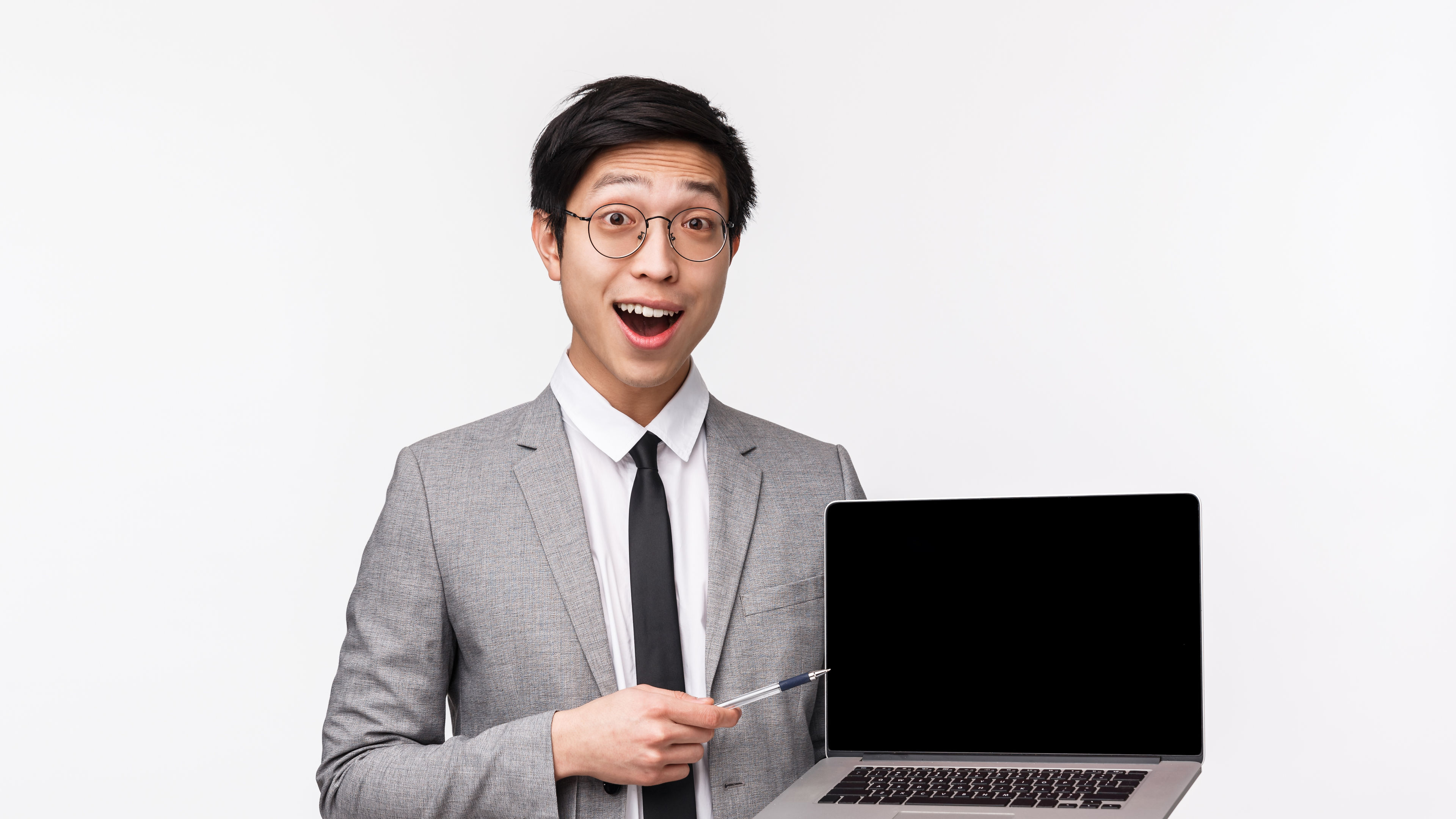Waist-up portrait of friendly-looking handsome young smart office manager 