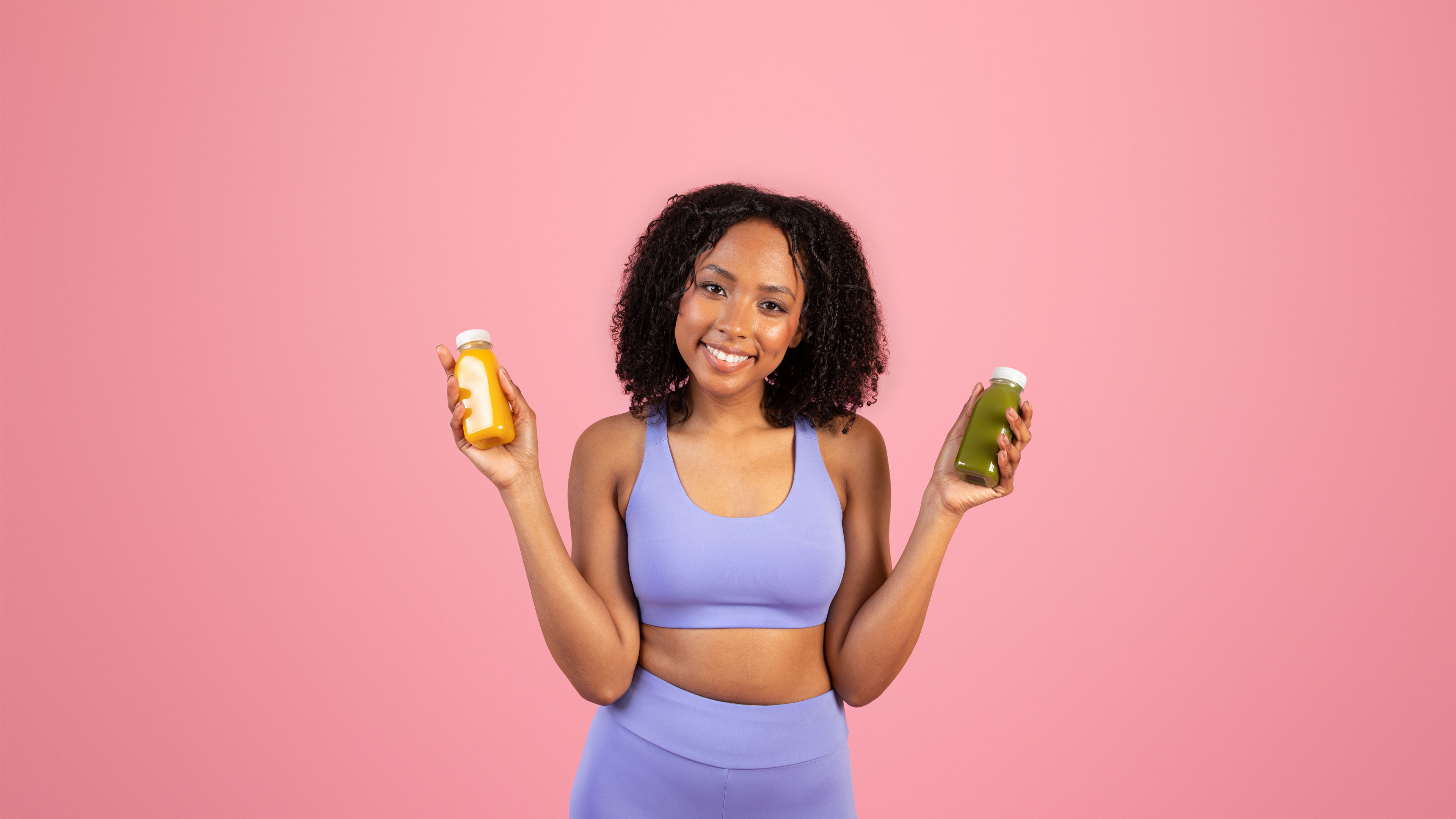 A woman holding supplements 