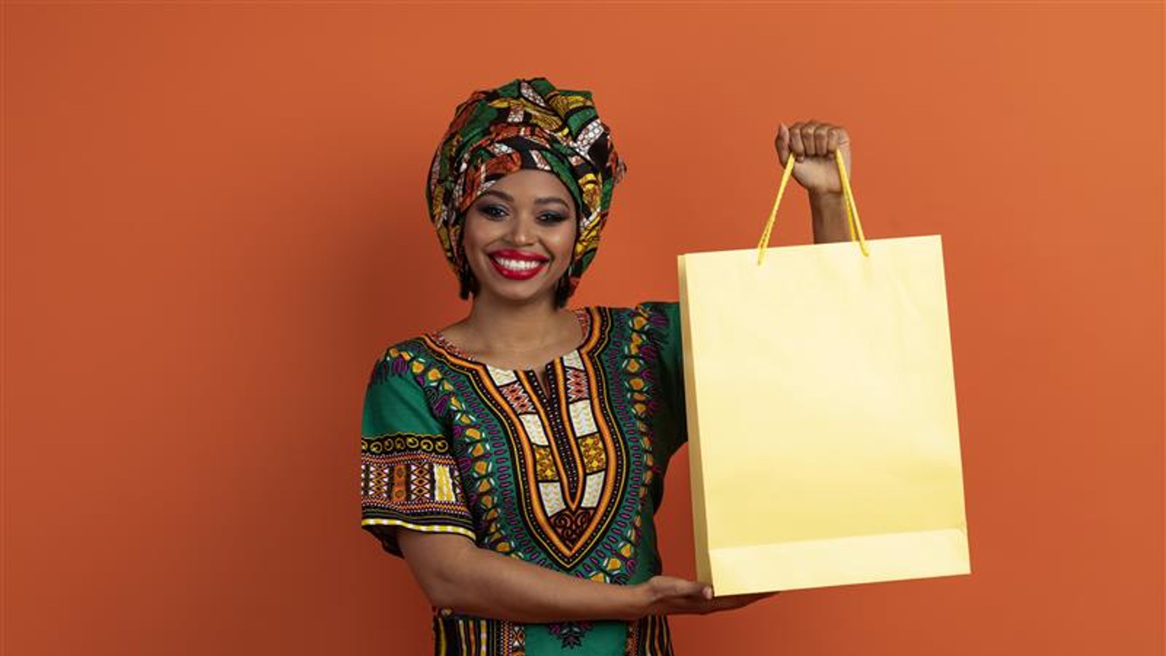 Happy cheerful pretty traditional african young woman