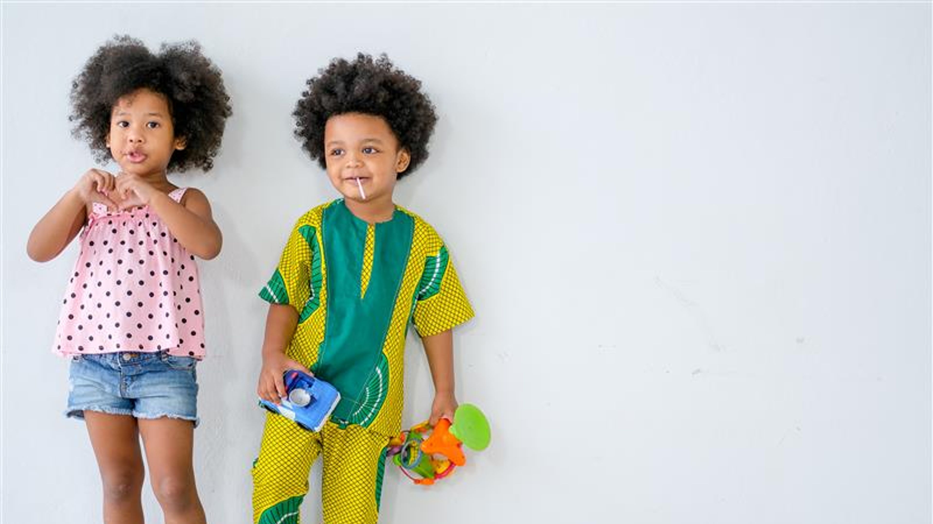 Two kids in fashionable dress