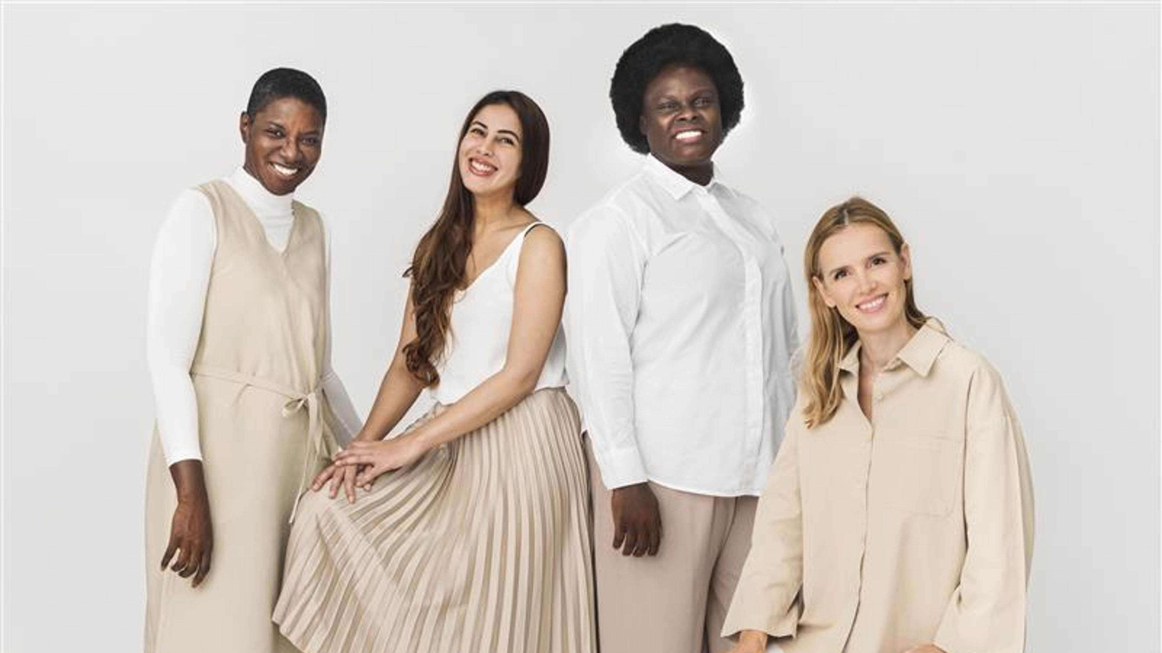 Women in white and cream coloured dress