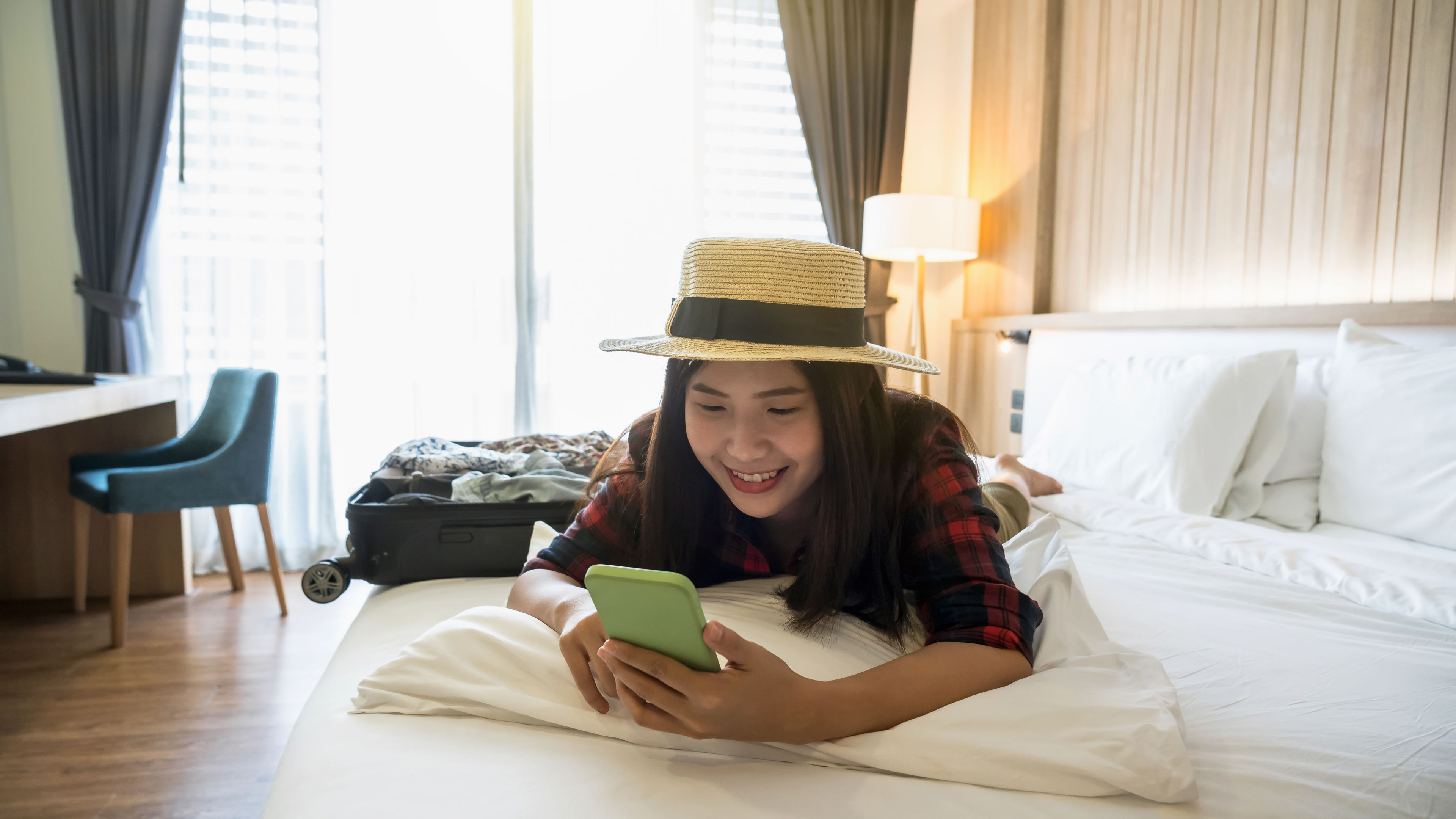 Asian traveler woman using the smart mobile phone