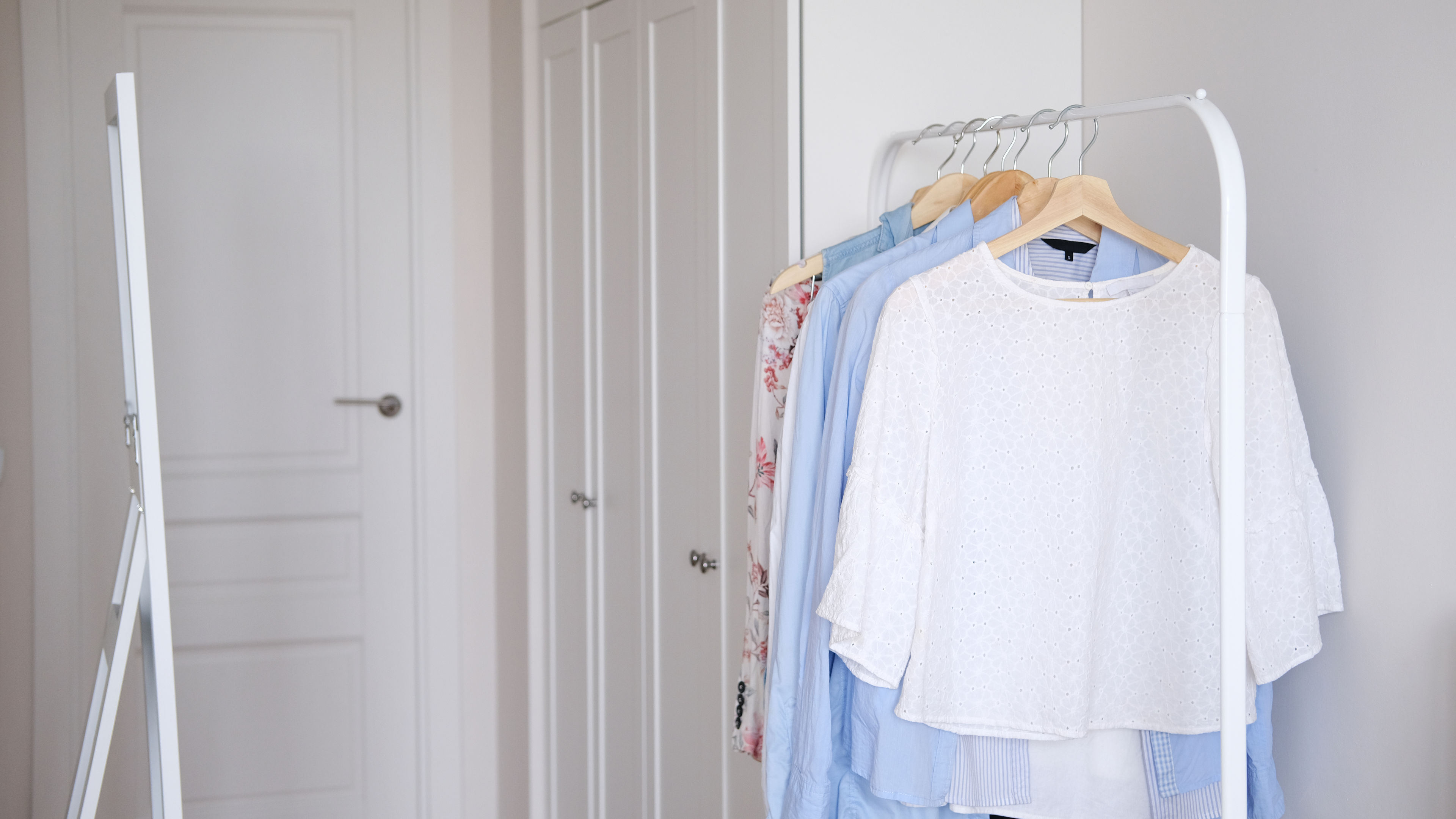 Rack with hanging clothes