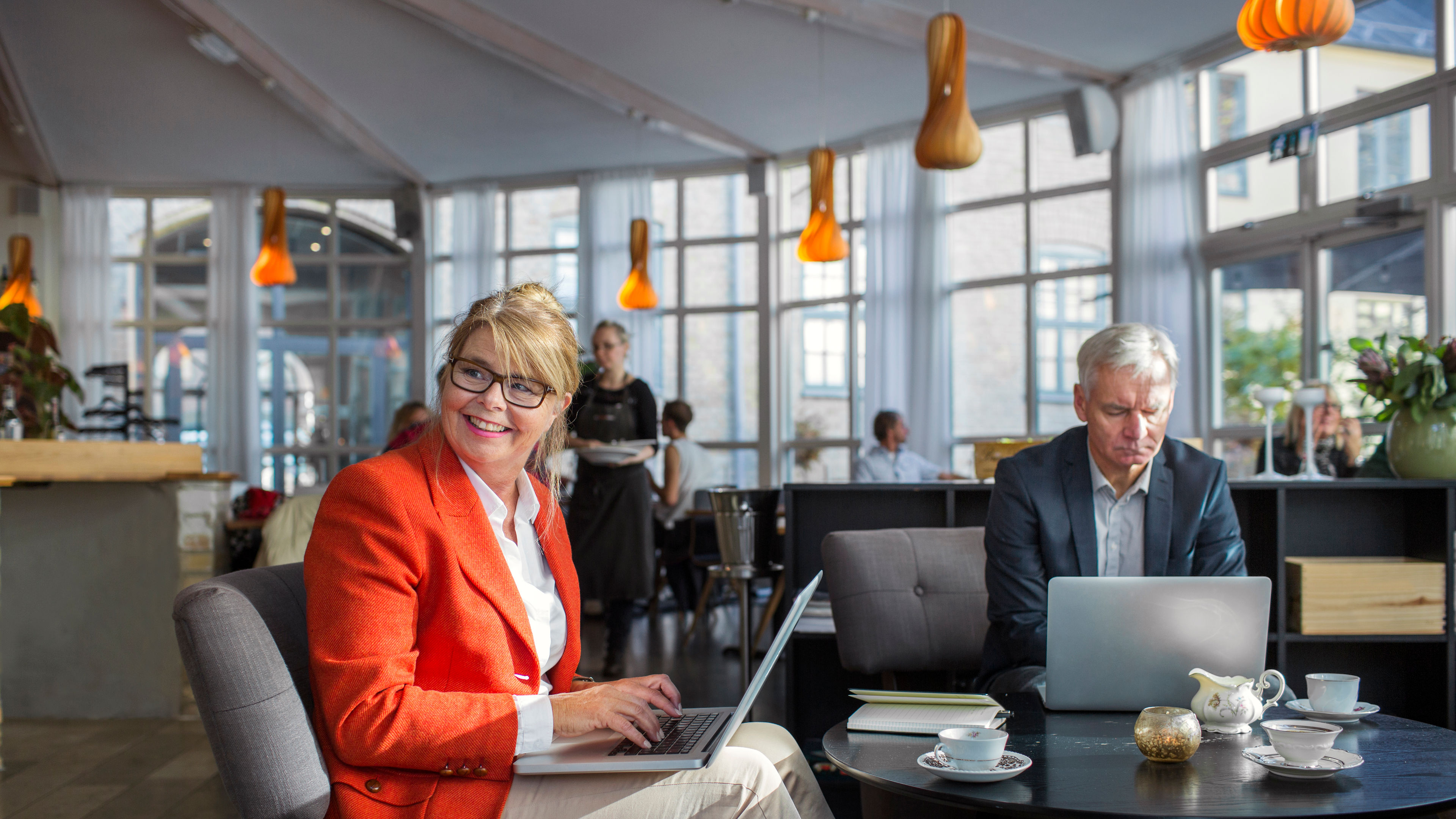 Business colleagues working in a lounge