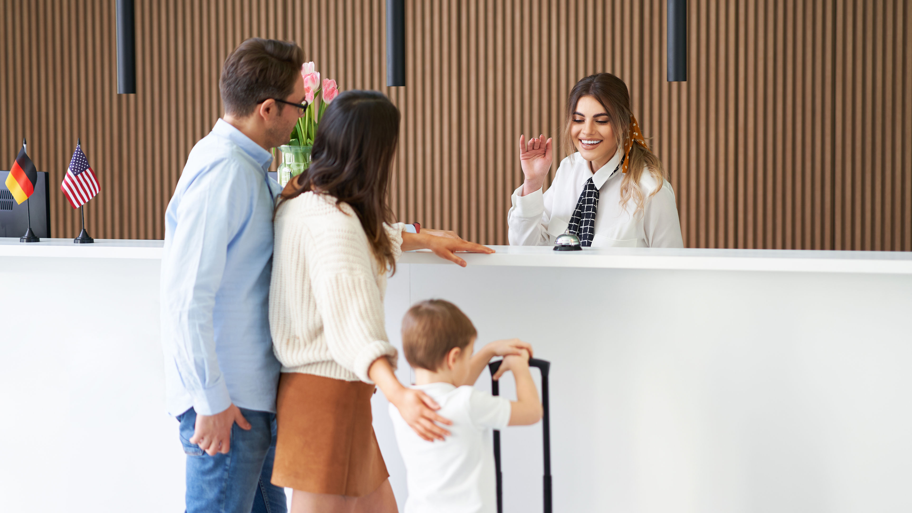 Family at hotel reception