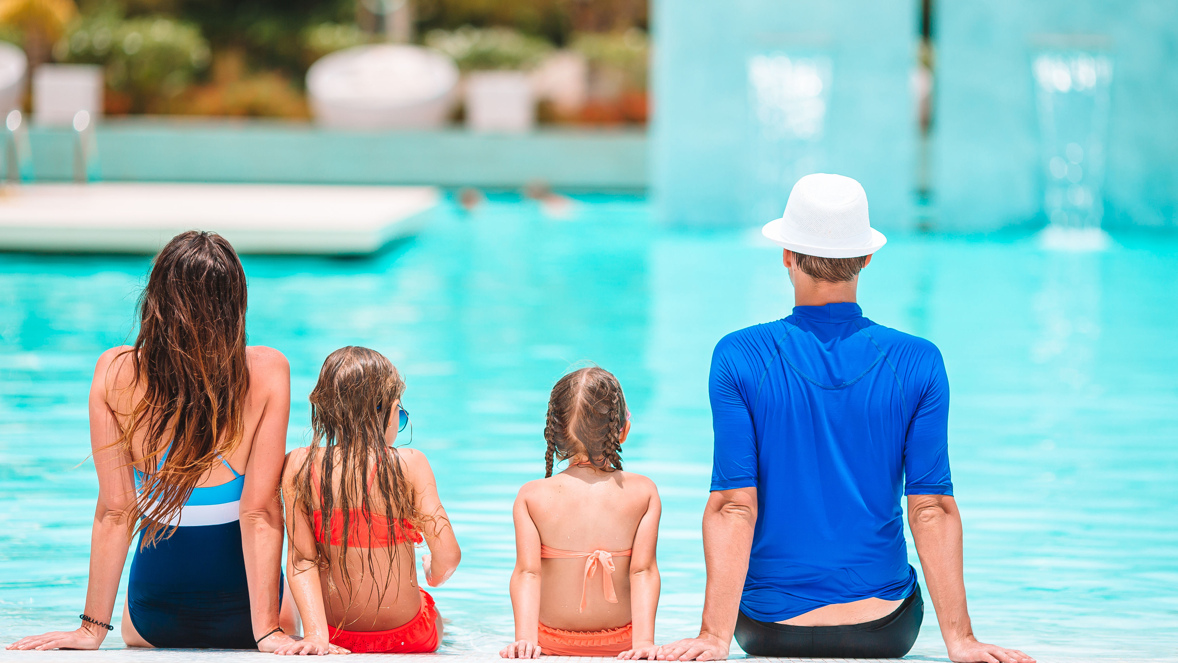Family at swimming pool
