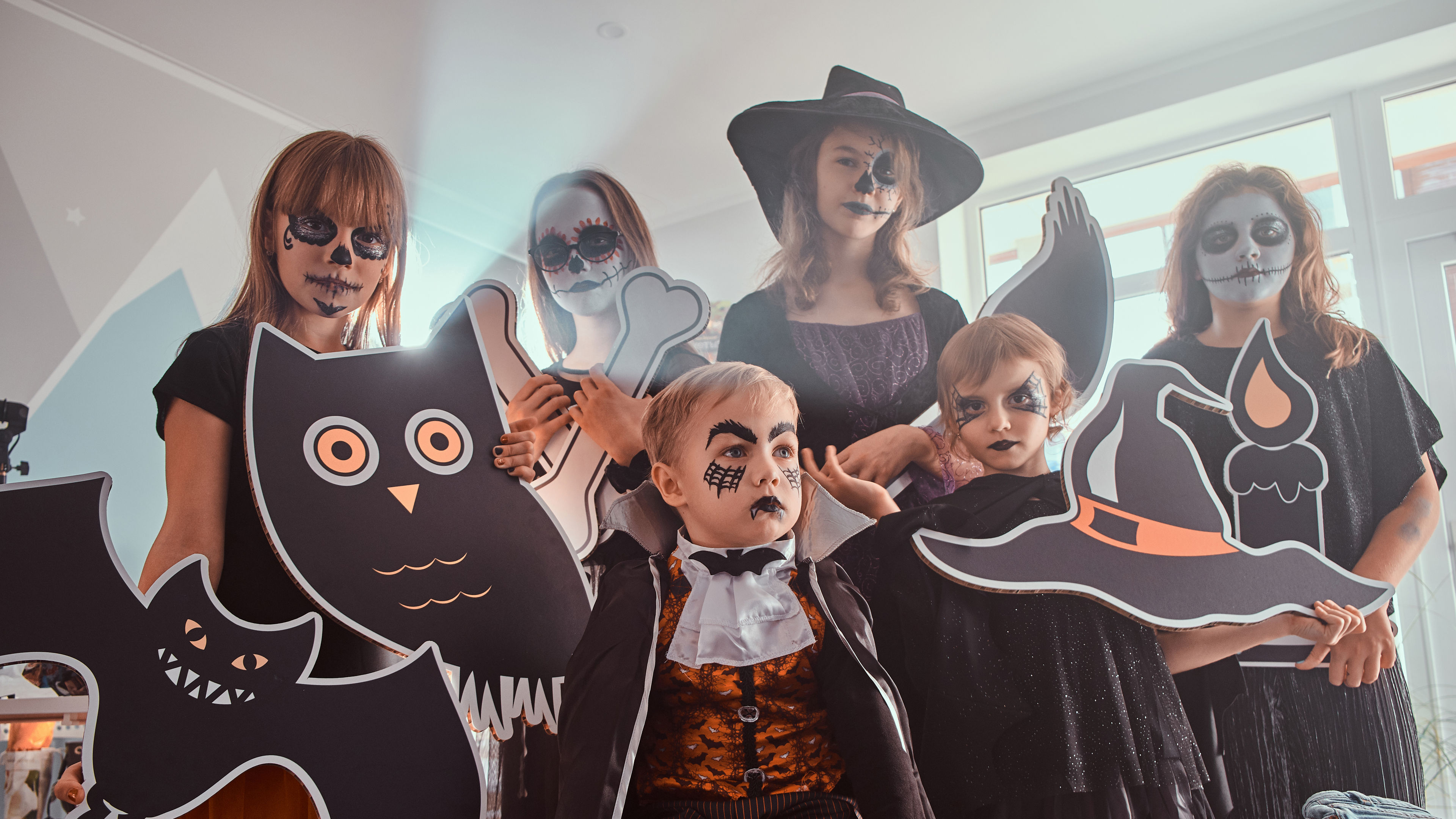 Kids having fun at a festive Halloween party. 