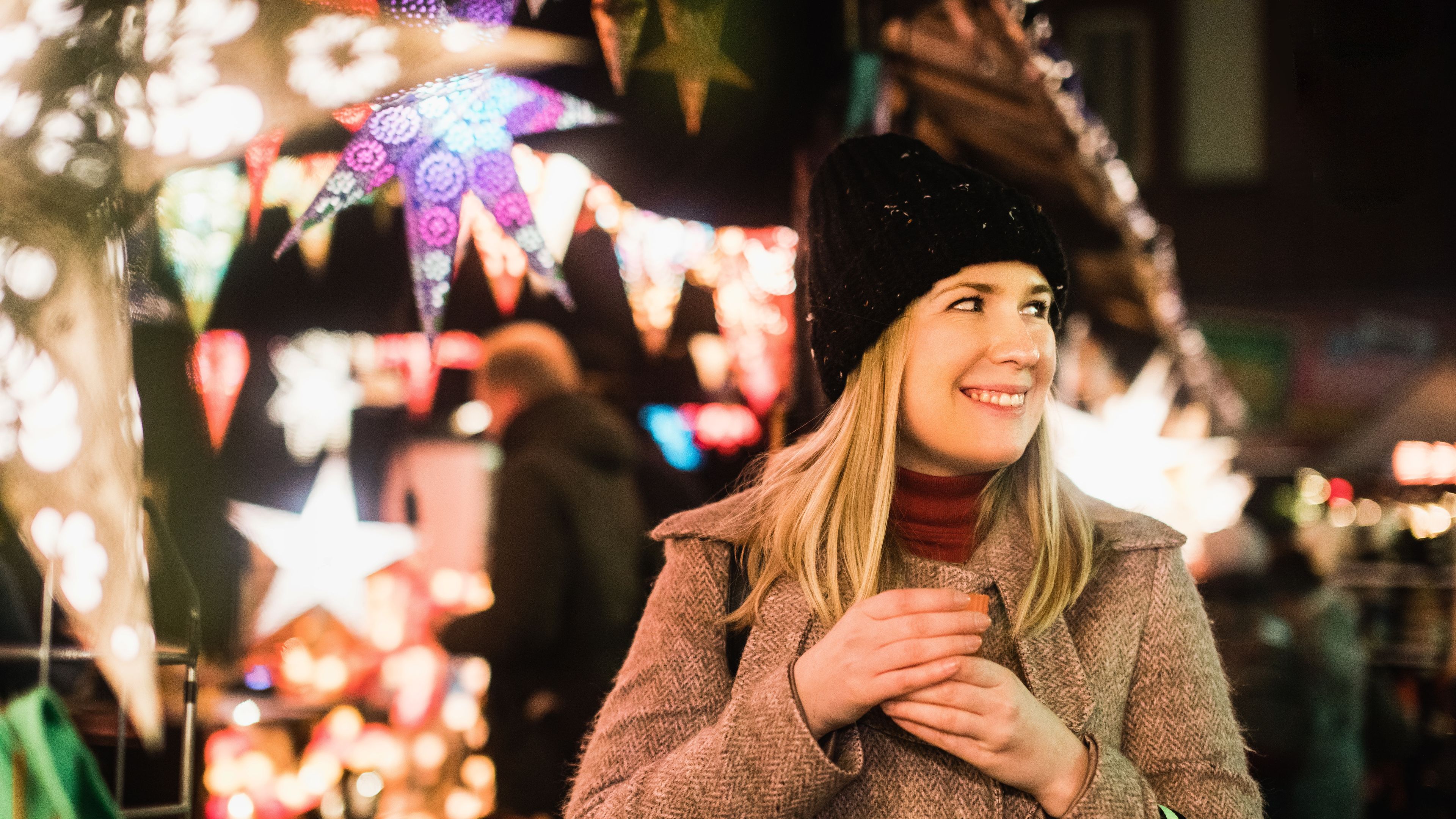 Portrait of a young woman wearing winter hat in UK 