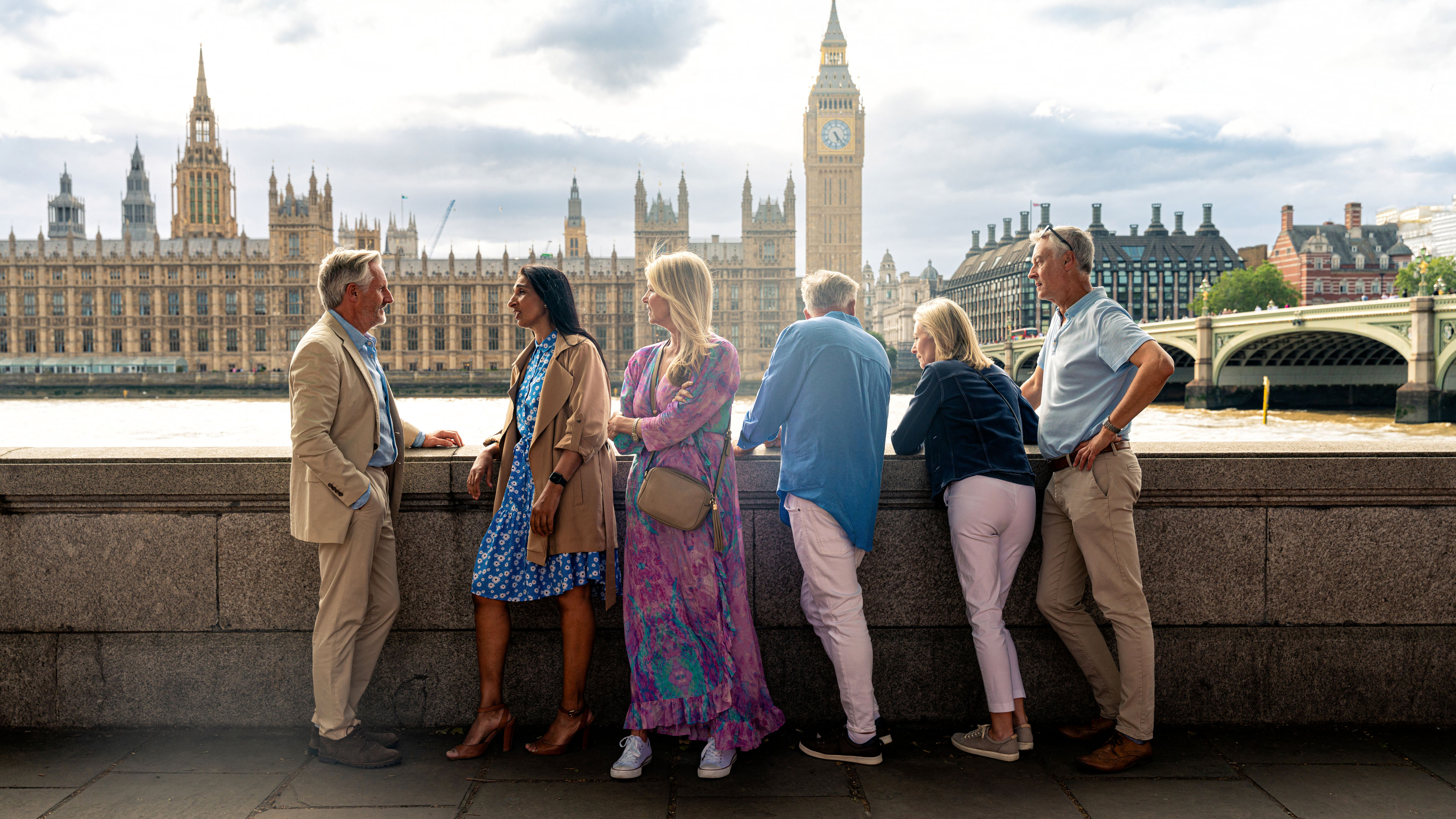 Senior group old buddies enjoying reunion in London
