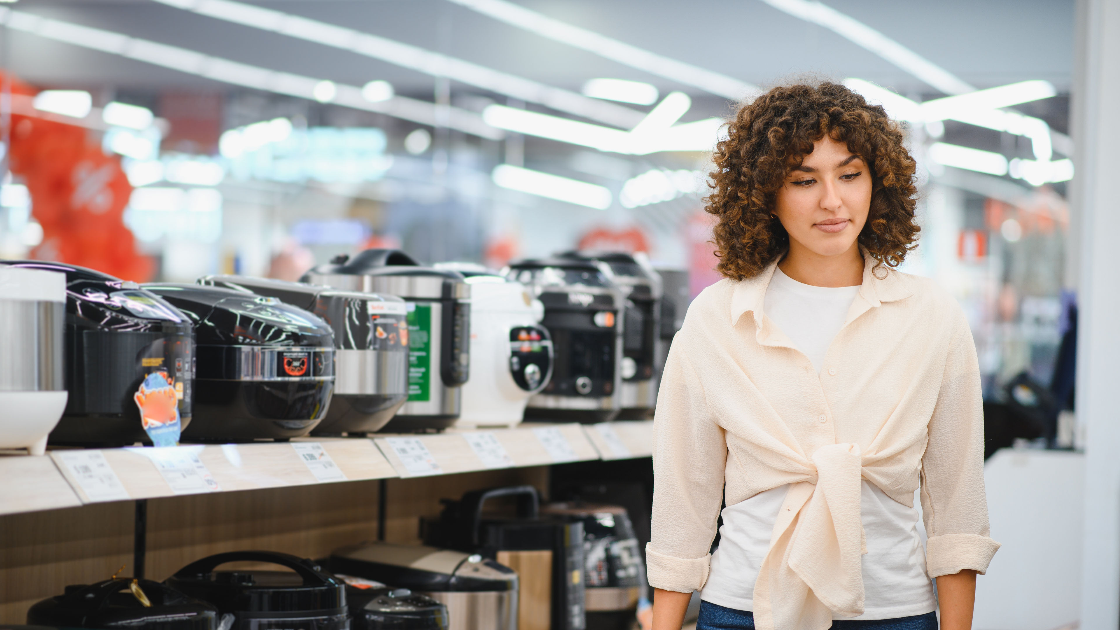 Woman at electronics store 