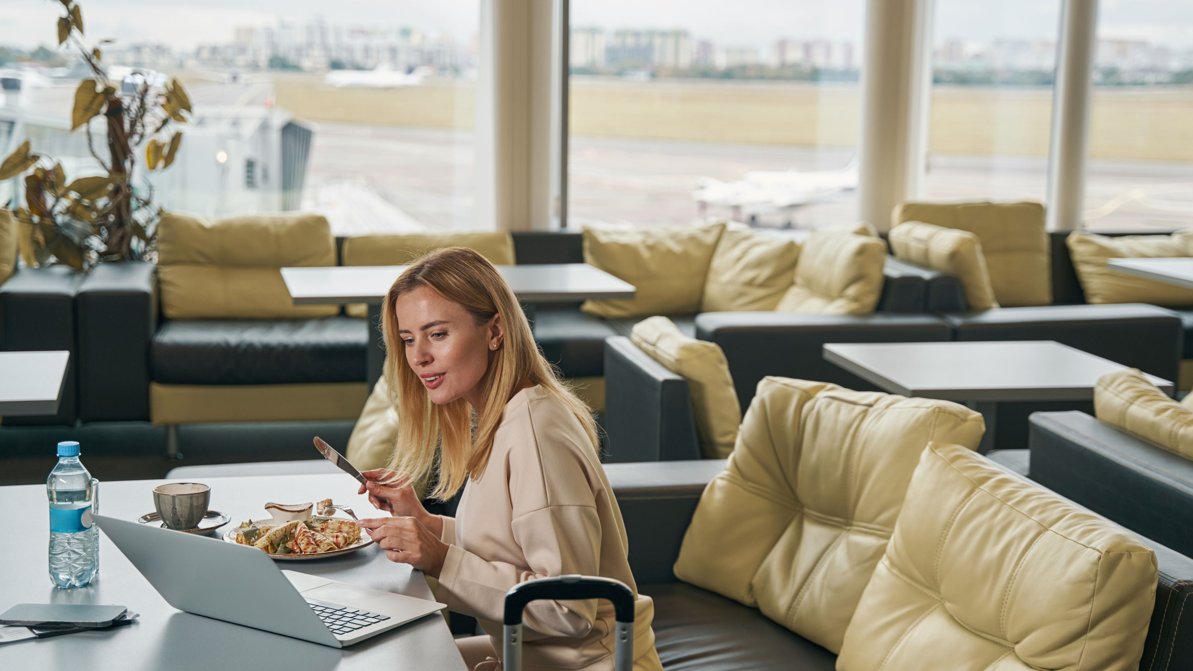 
Woman near airport window