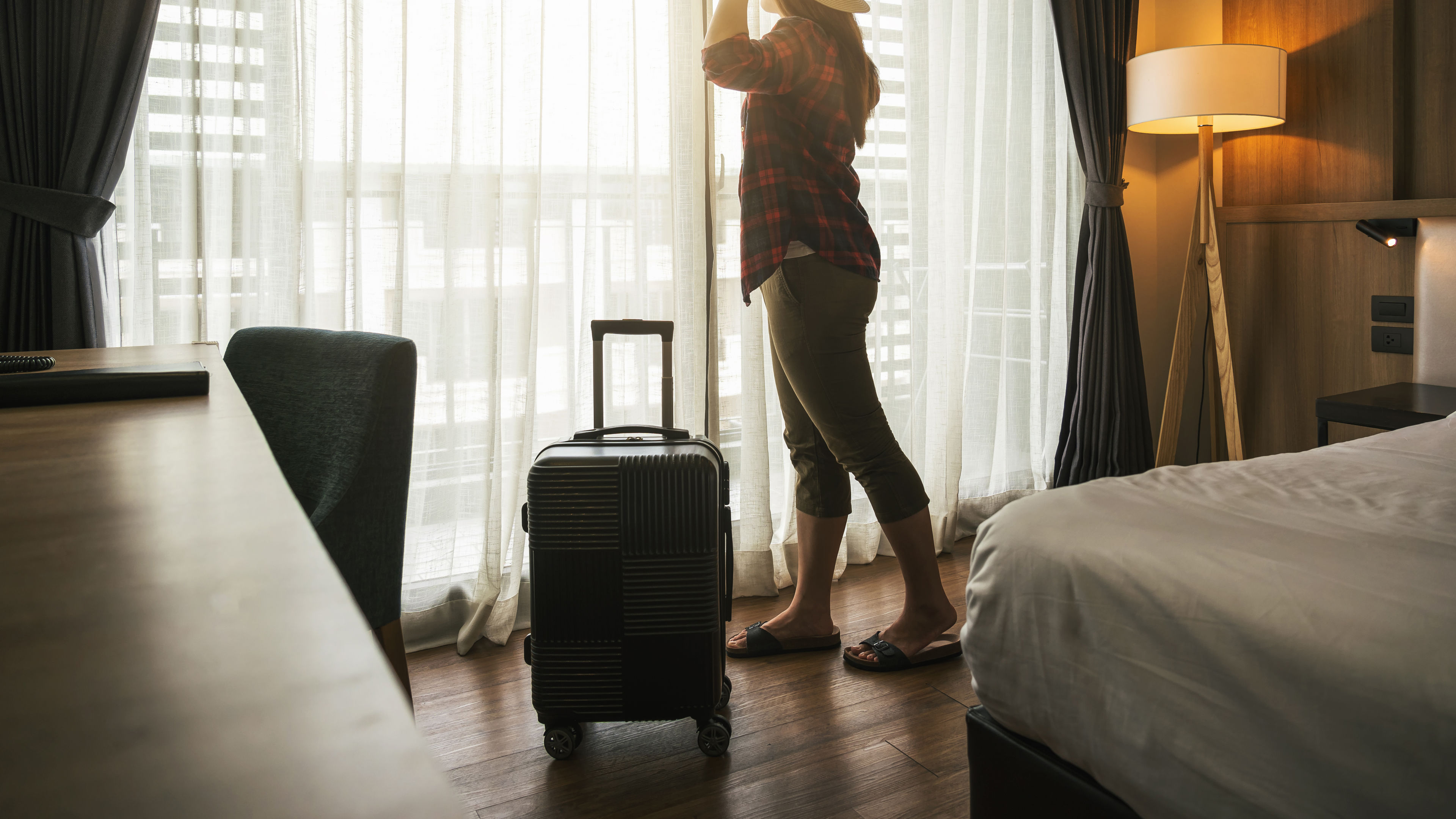 Woman standing with bag