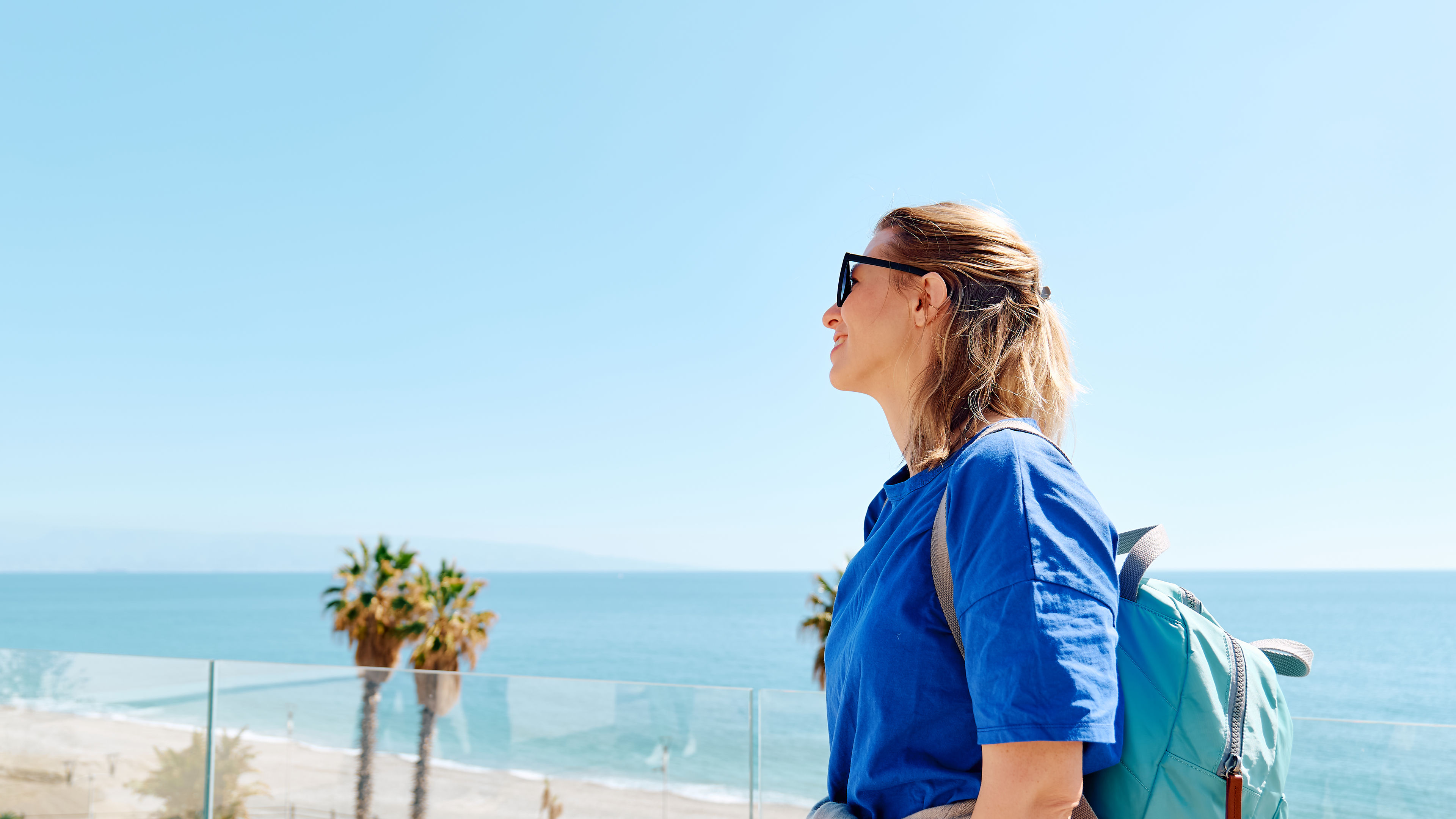 Woman tourist with backpack